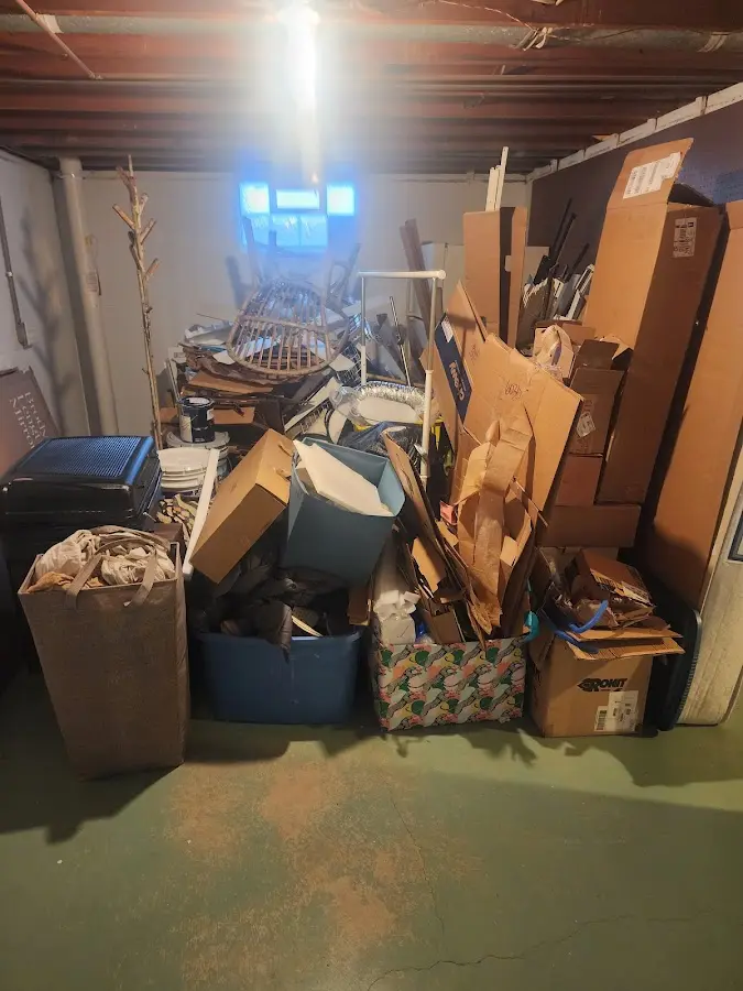 Roll-off dumpster container at job site for 4 Yard Dumpster Rental in Berwyn Heights